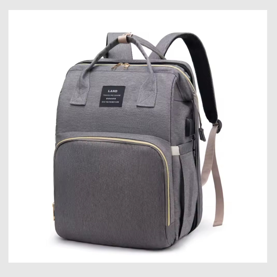 BabyNest 3-en-1™ – Le sac à langer, berceau et parc de jeu tout-en-un.