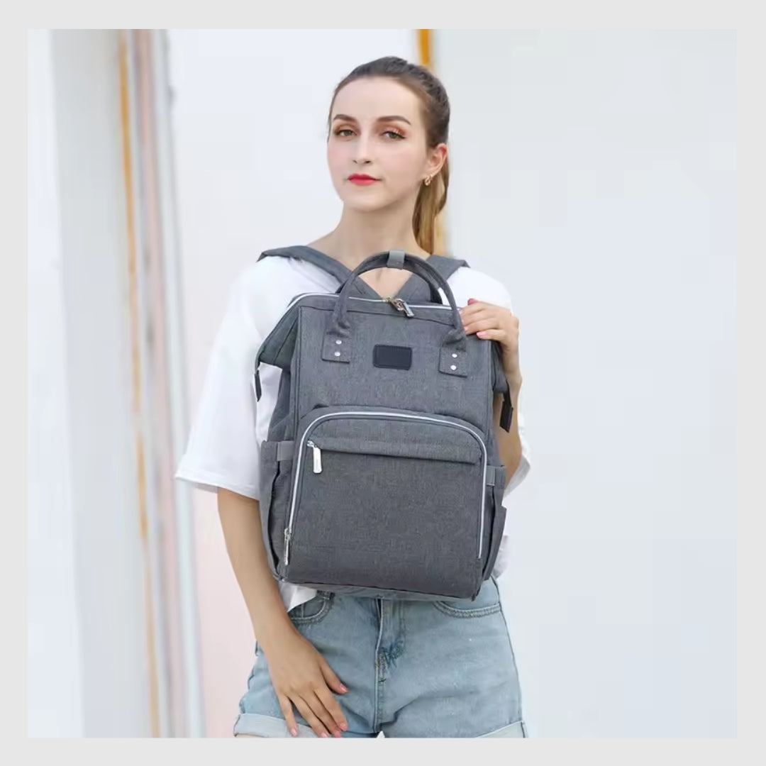 BabyNest 3-en-1™ – Le sac à langer, berceau et parc de jeu tout-en-un.